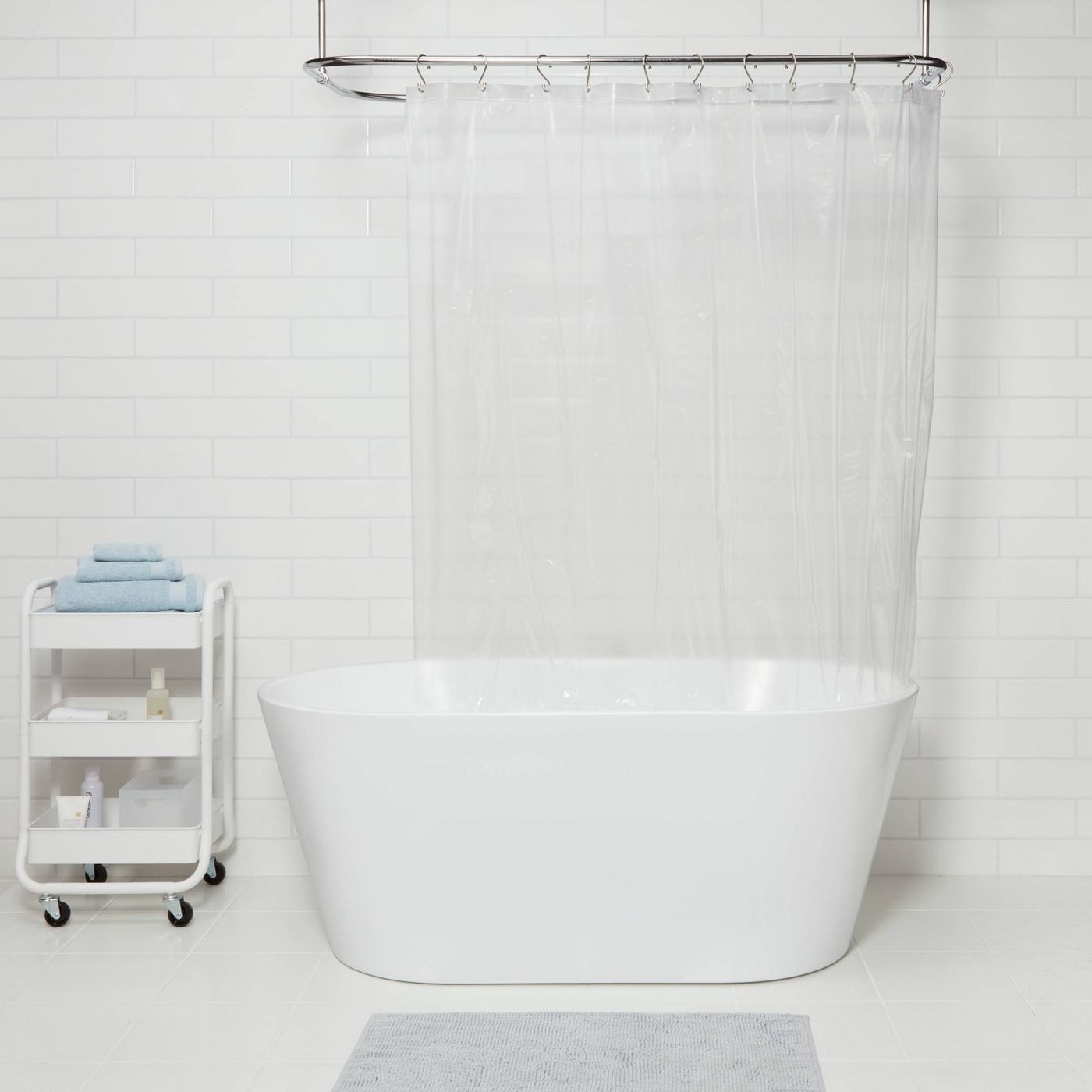 Bathroom with clear shower liner