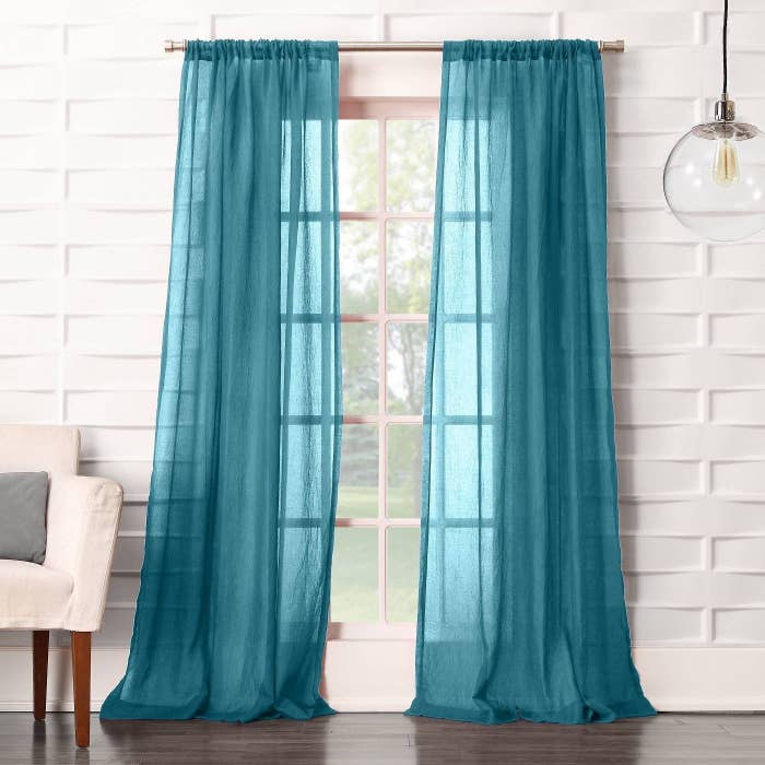 Blue sheer curtains in a home