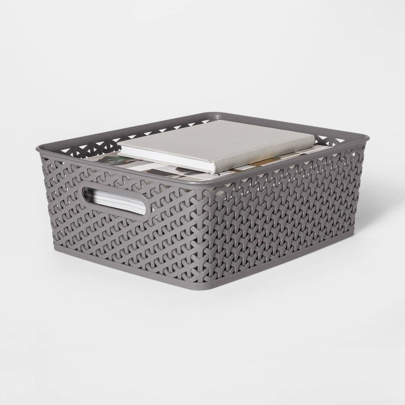 A grey storage basket