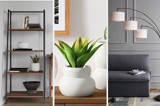 A bookshelf on the left and a ceramic vase with a faux plant in the middle and an arc lamp on the left