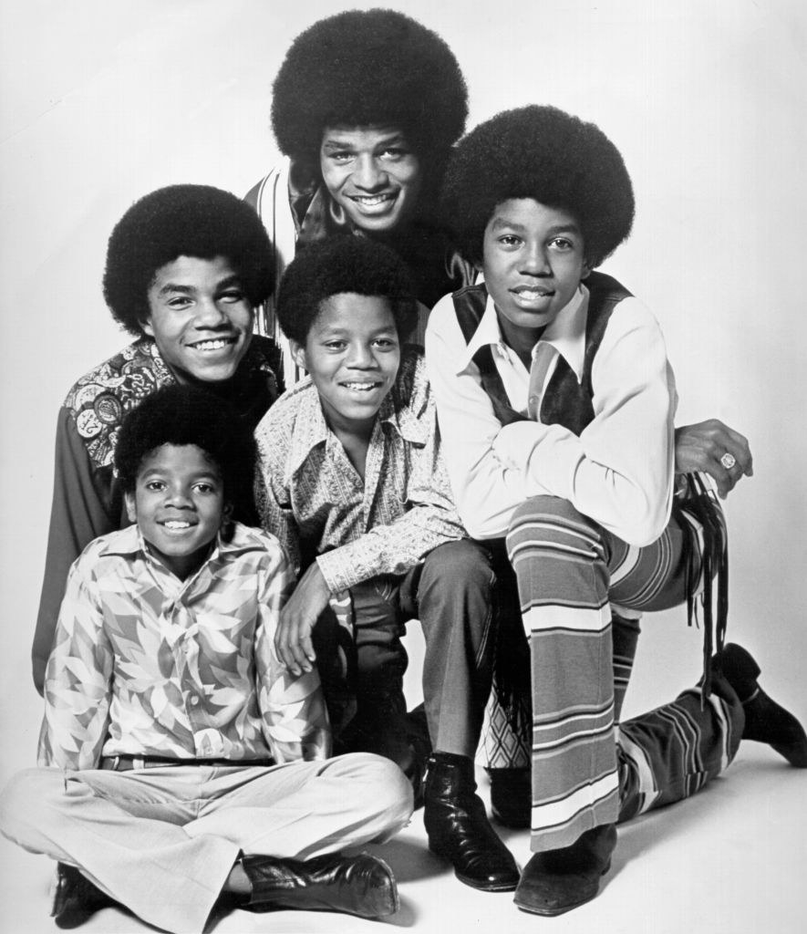 Michael Jackson, Tito Jackson, Jackie Jackson, Jermaine Jackson, and Marlon Jackson pose for a portrait together in 1969
