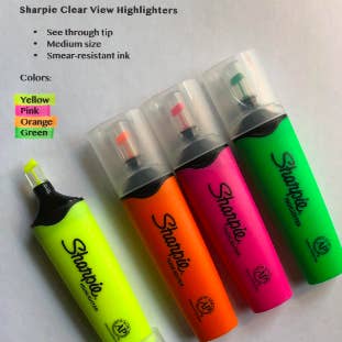 Four highlighters with clear tips above page marked with each different color 