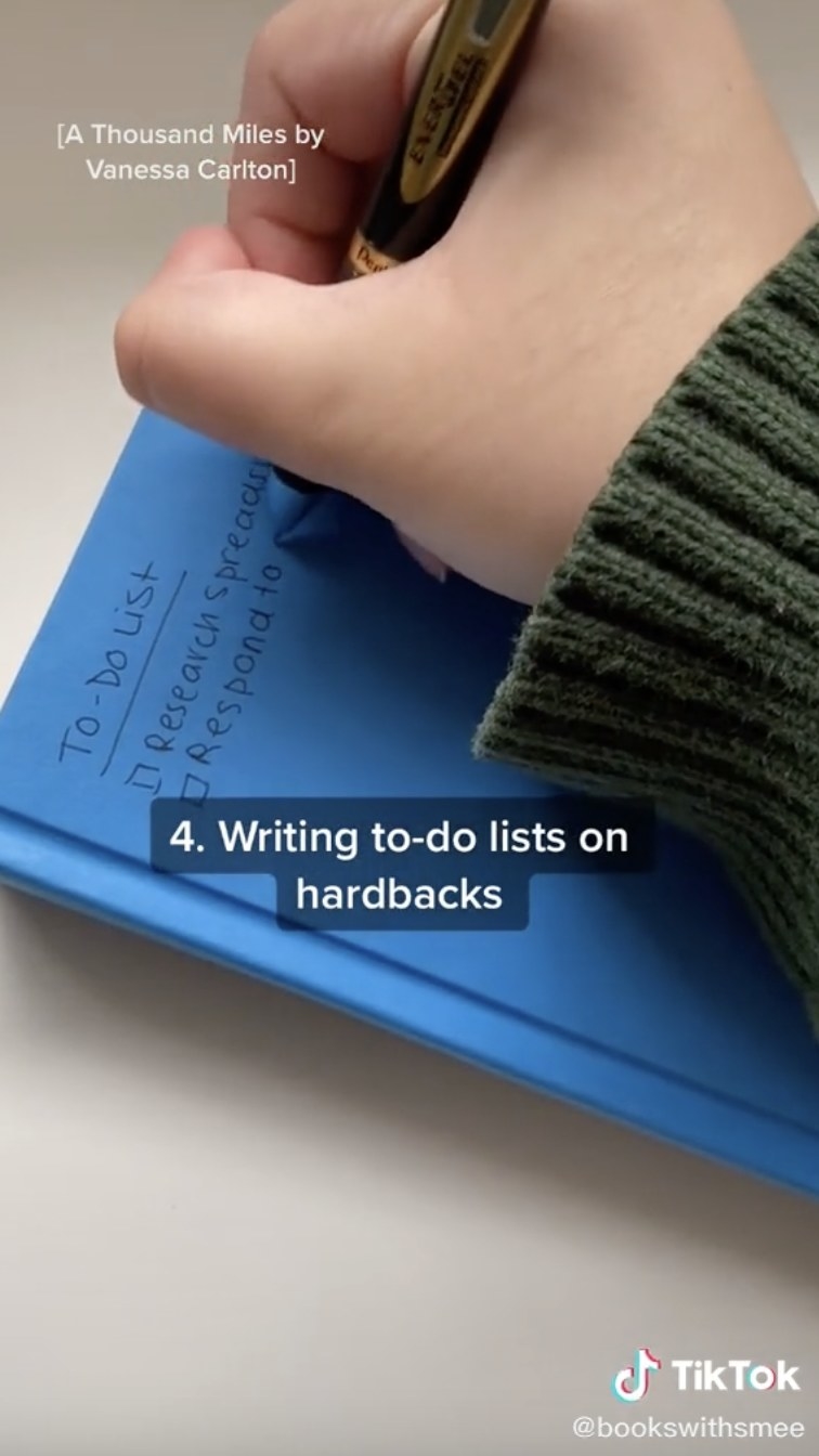 TikTok of making to-do list on blue book