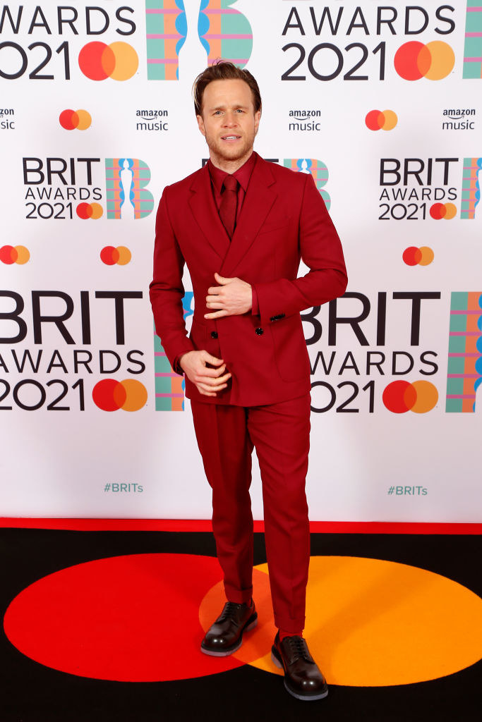 Olly Murs rocks a monochrome suit, tie, and shirt at The BRIT Awards 2021