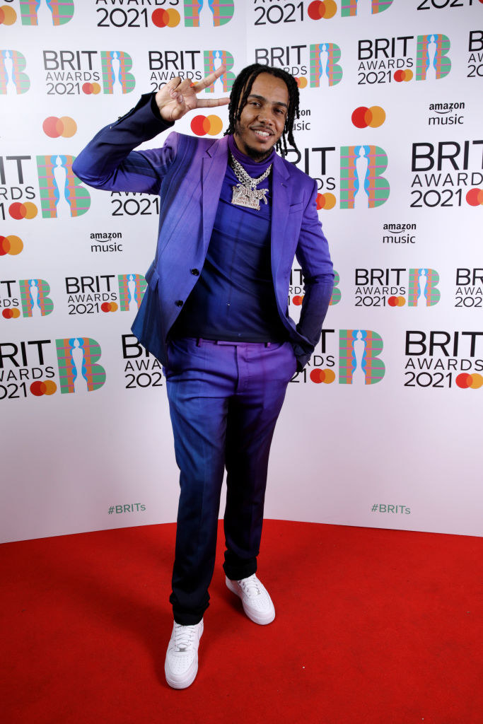 AJ Tracey poses in the media room during The BRIT Awards 2021