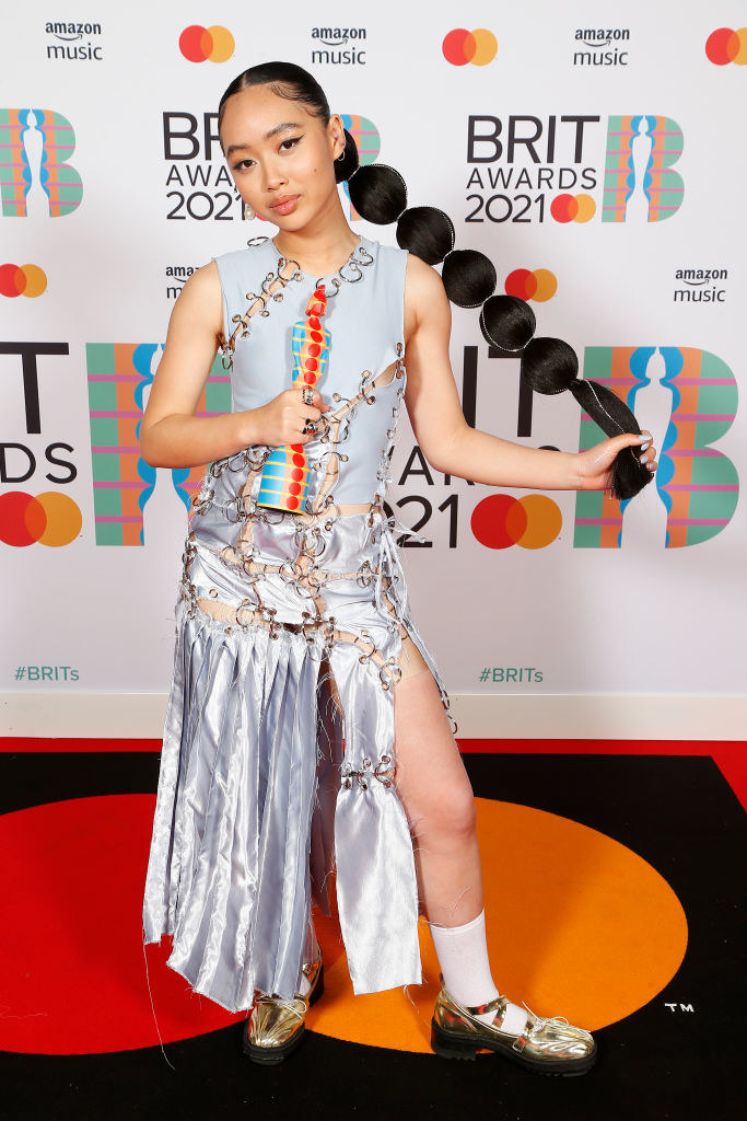 Griff poses with the BRITs Rising Star award in the media room