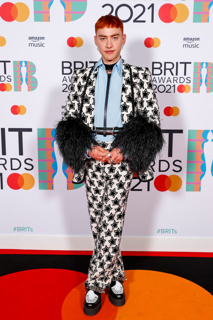 Olly Alexander poses in the media room