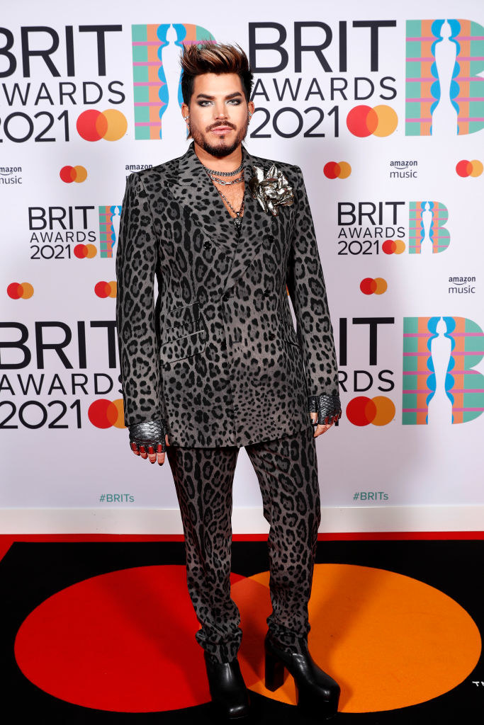 Adam Lambert poses in the media room