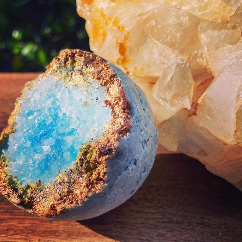 the geode bath bomb with glowing blue in the center