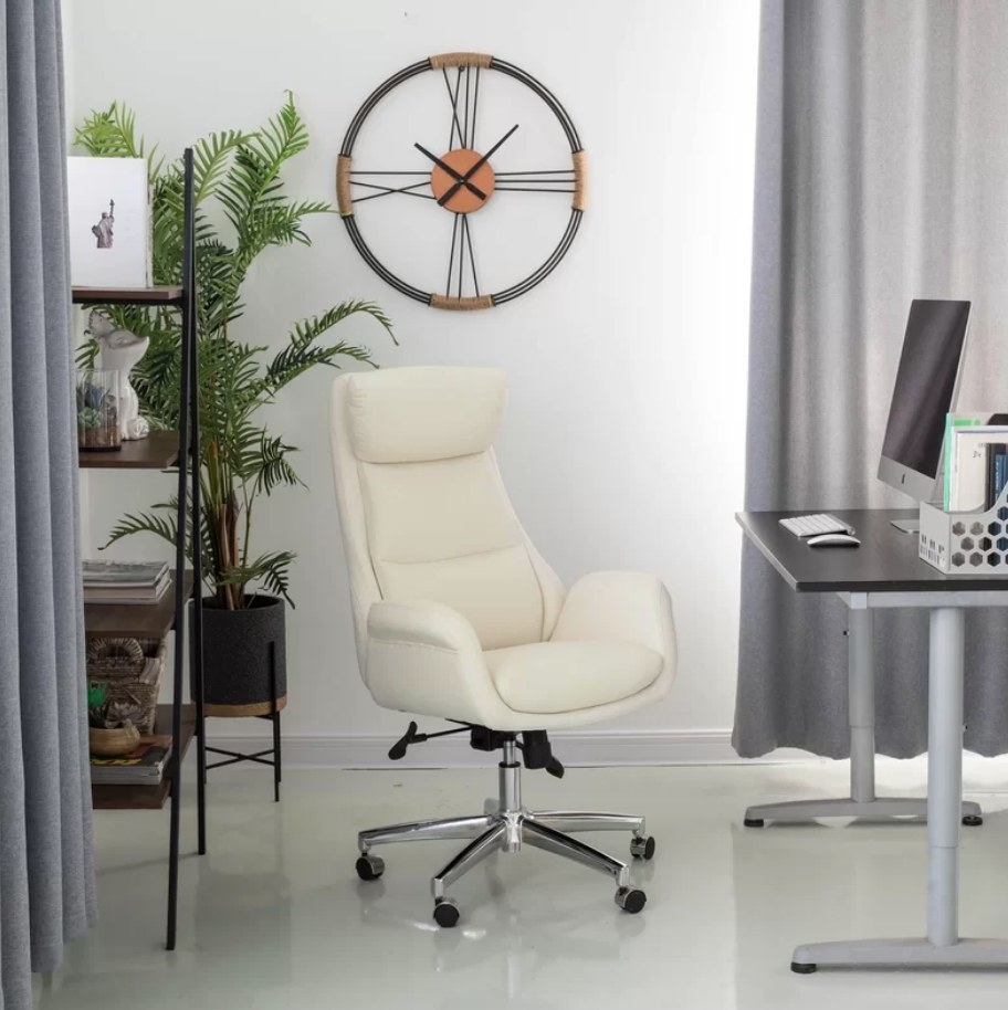 White upholstered office chair in office