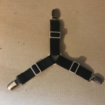 a reviewer photo of the three-sided sheet suspender 