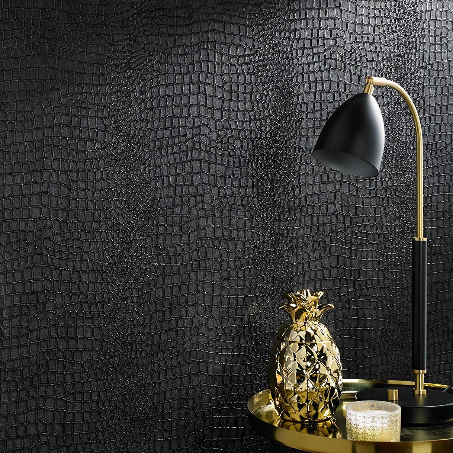 A wall with crocodile wallpaper