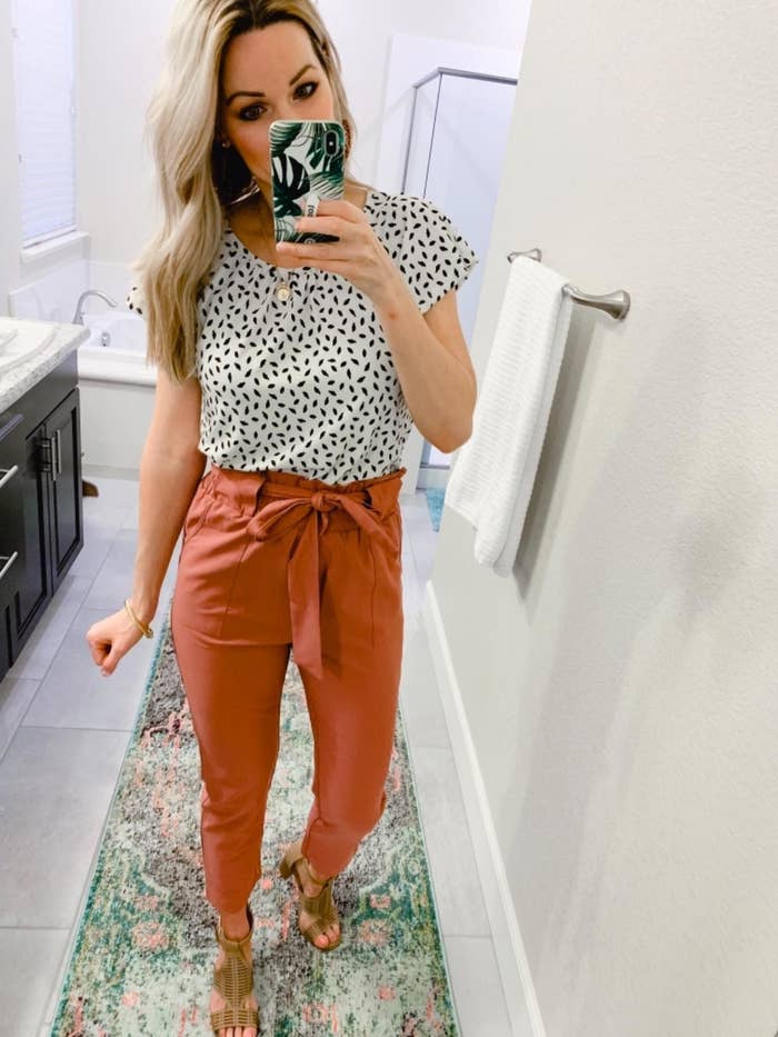 reviewer takes picture in the drawstring pants