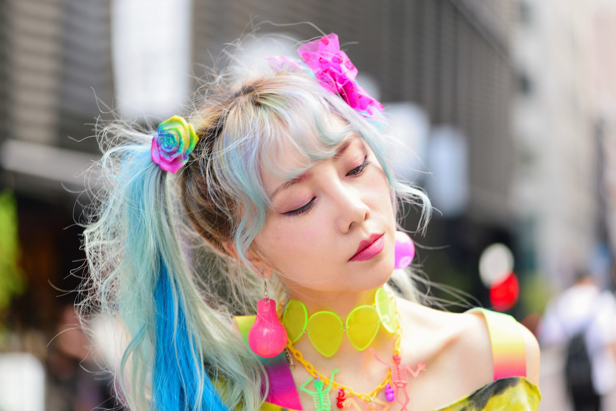 Japanese woman with colorful hair and neon accessories