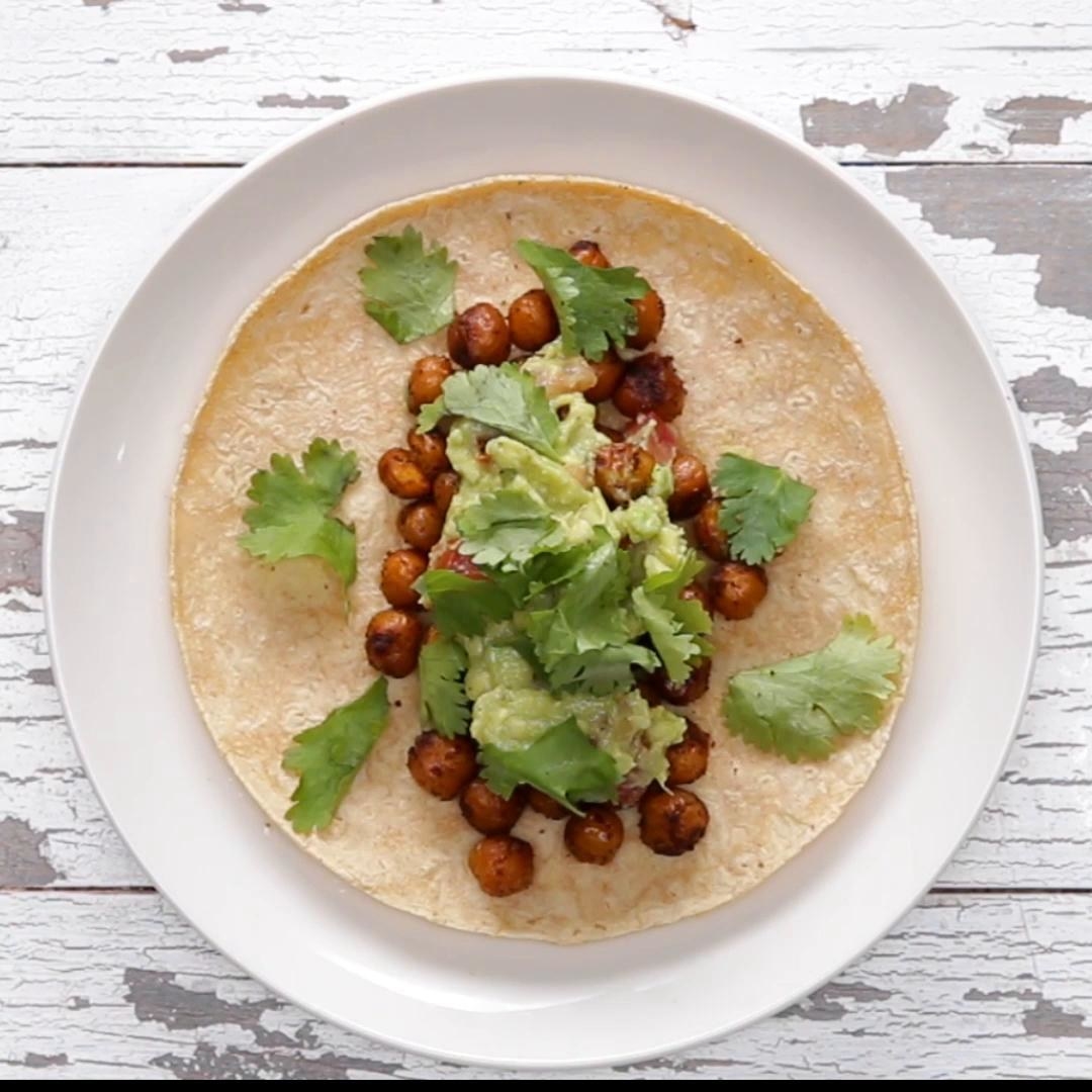 Tortilla with chickpeas and cilantro on top