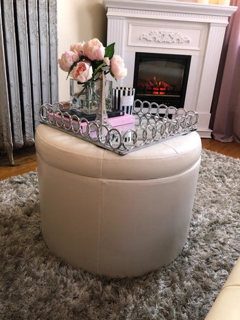 the blush colored ottoman