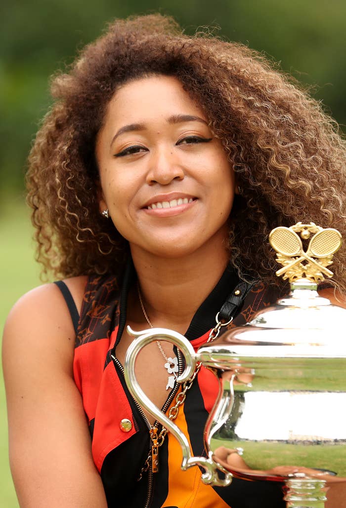 Naomi Osaka of Japan poses with the Daphne Akhurst Memorial Cup after winning the 2021 Australian Open Women's Final, at Government House on February 21, 2021, in Melbourne, Australia