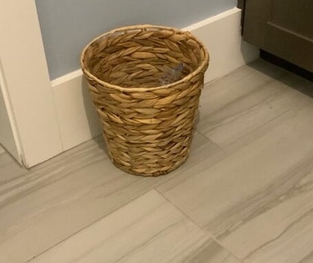a reviewer&#x27;s wicker trashcan 