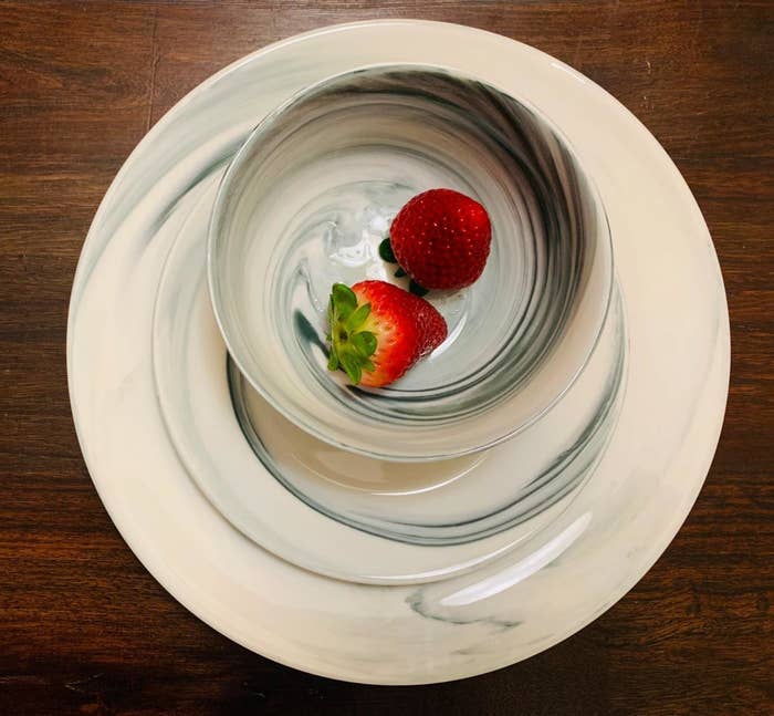 reviewer image of strawberries inside a porcelain bowl atop a porcelain plate
