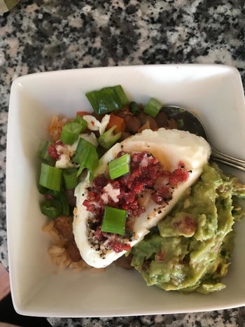 Poached eggs with rice, beans, and guac