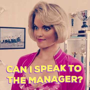 An annoyed woman asking if she can speak to the manager