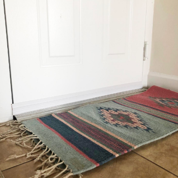 Reviewer image with bottom of front door covered with the stopper