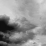 Black and white clouds overhead