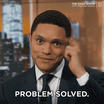 a gif of Trevor Noah tapping his temple and saying &quot;problem solved&quot; 