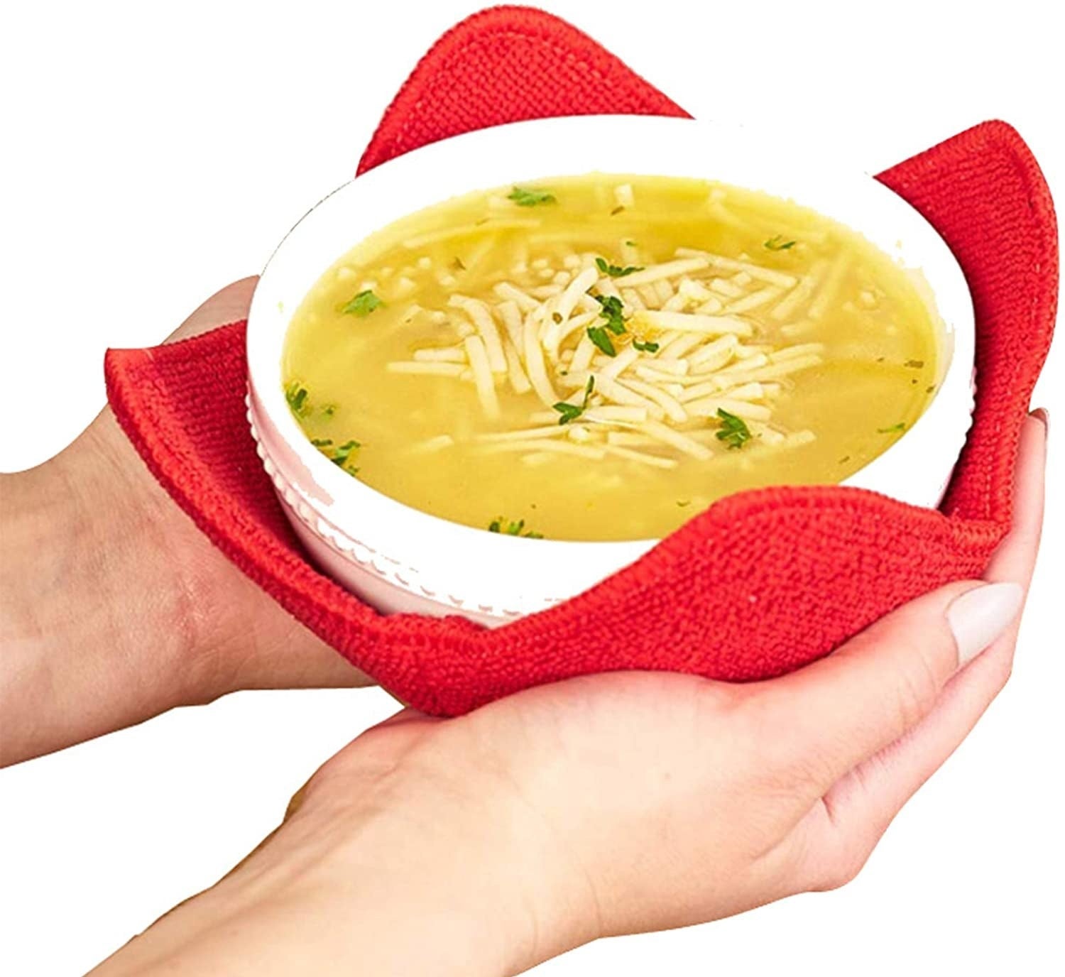 A pair of hands holding a bowl that's resting in the red bowl hugger