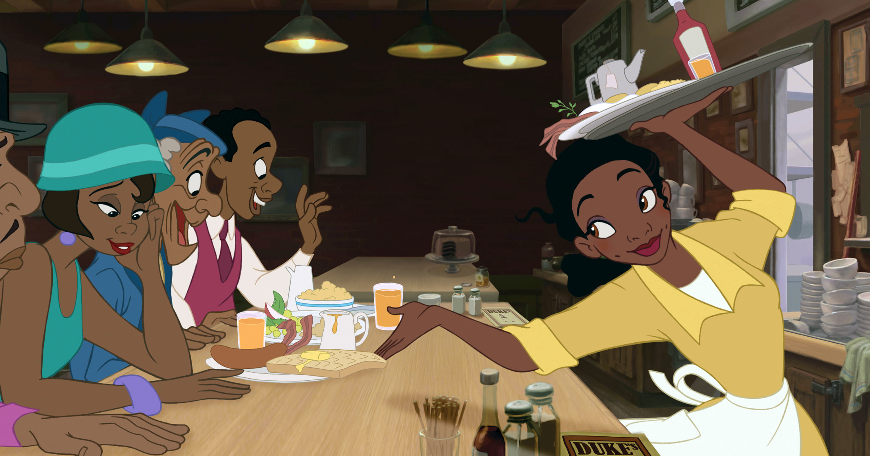Photo of Princess Tiana at her waitress job lifting a tray with her left hand