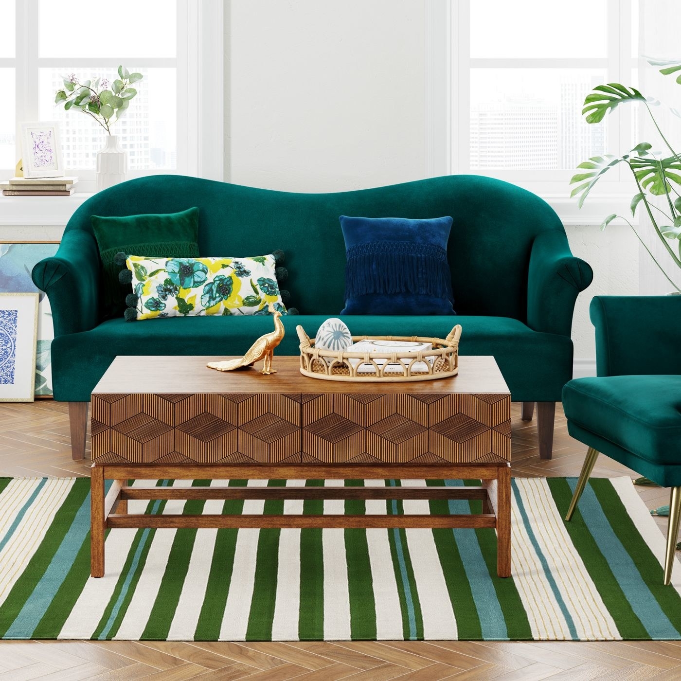 green, cream, and blue striped woven rug in a living room with matching furniture