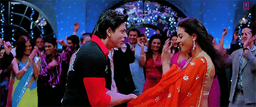 Shah Rukh Khan and Kajol doing their iconic greeting from Kuch Kuch Hota Hai