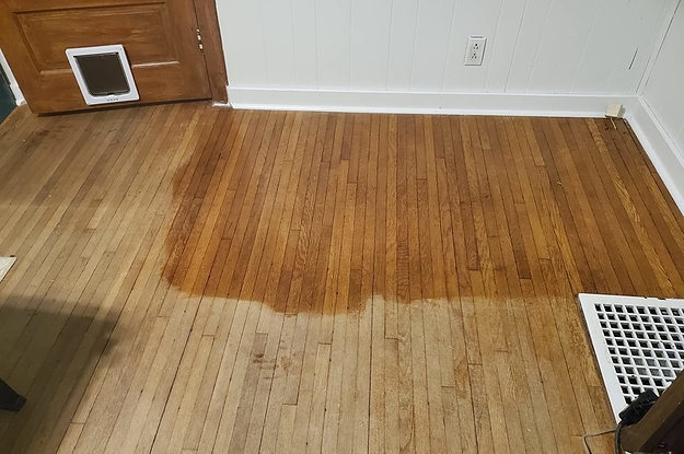reviewer photo showing half of their floor looking completely new after applying the Feed-N-Wax to it