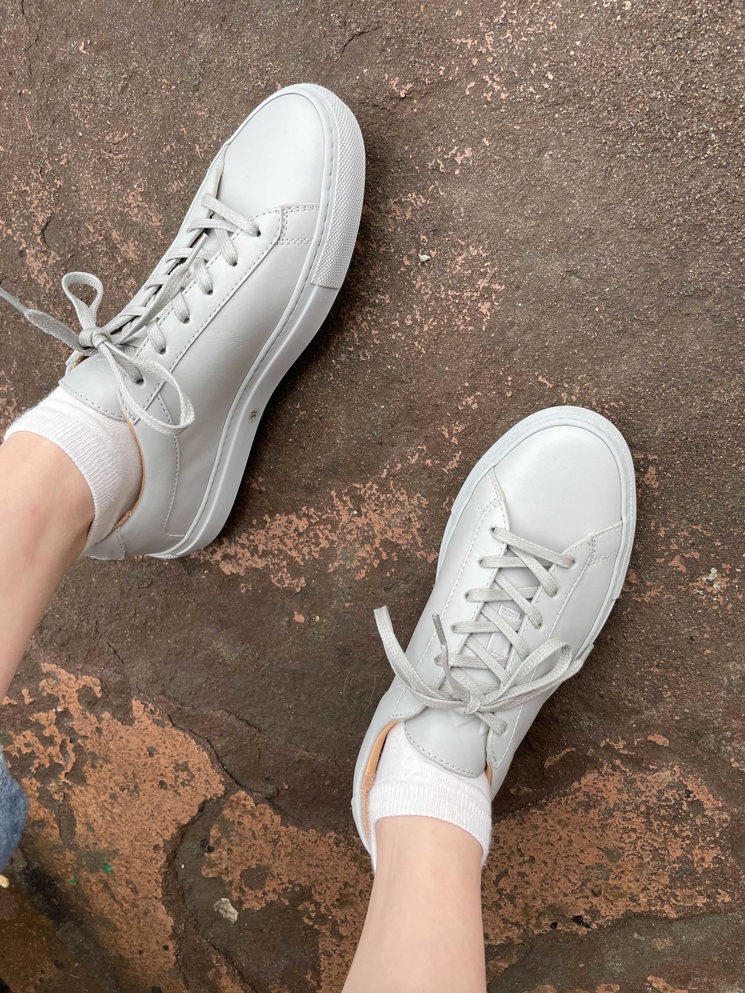 buzzfeed editor wearing the shoes in gray