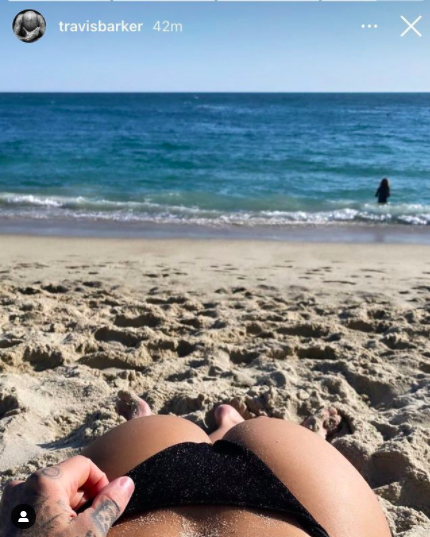 Another photo on the beach with Travis&#x27;s hand on Kourtney&#x27;s ass