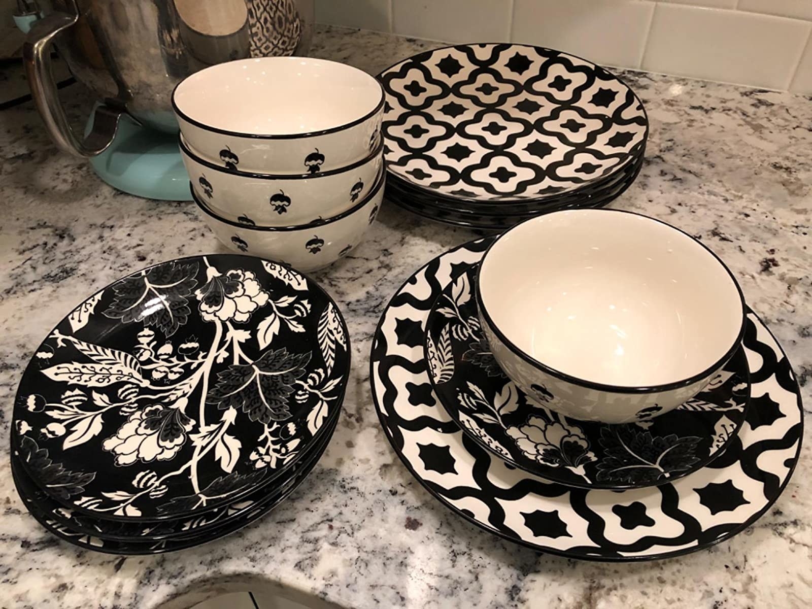 reviewer image of the wisenvoy dinnerware set on a kitchen counter