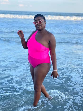 Reviewer wearing pink bathing suit