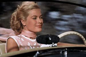 Grace Kelly driving a car