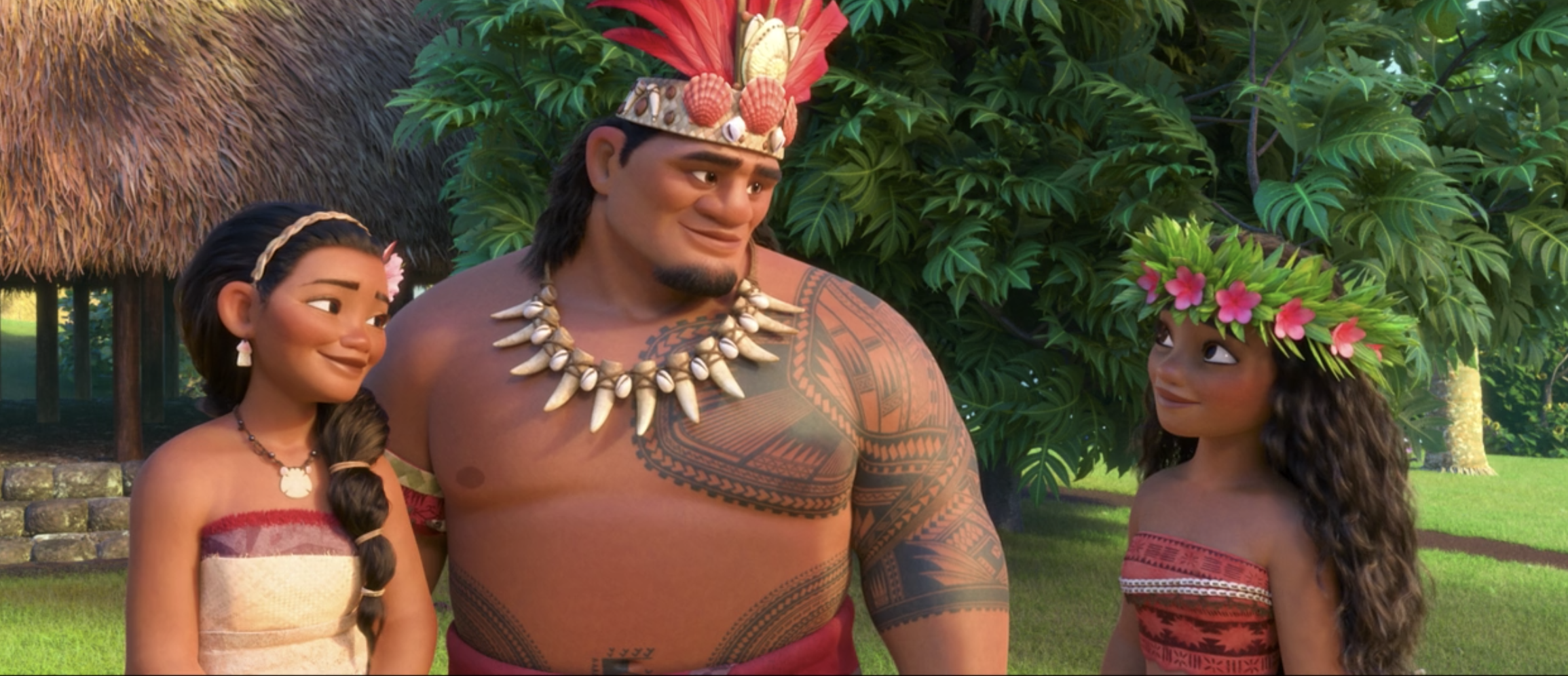 Moana grinning at her mom and dad