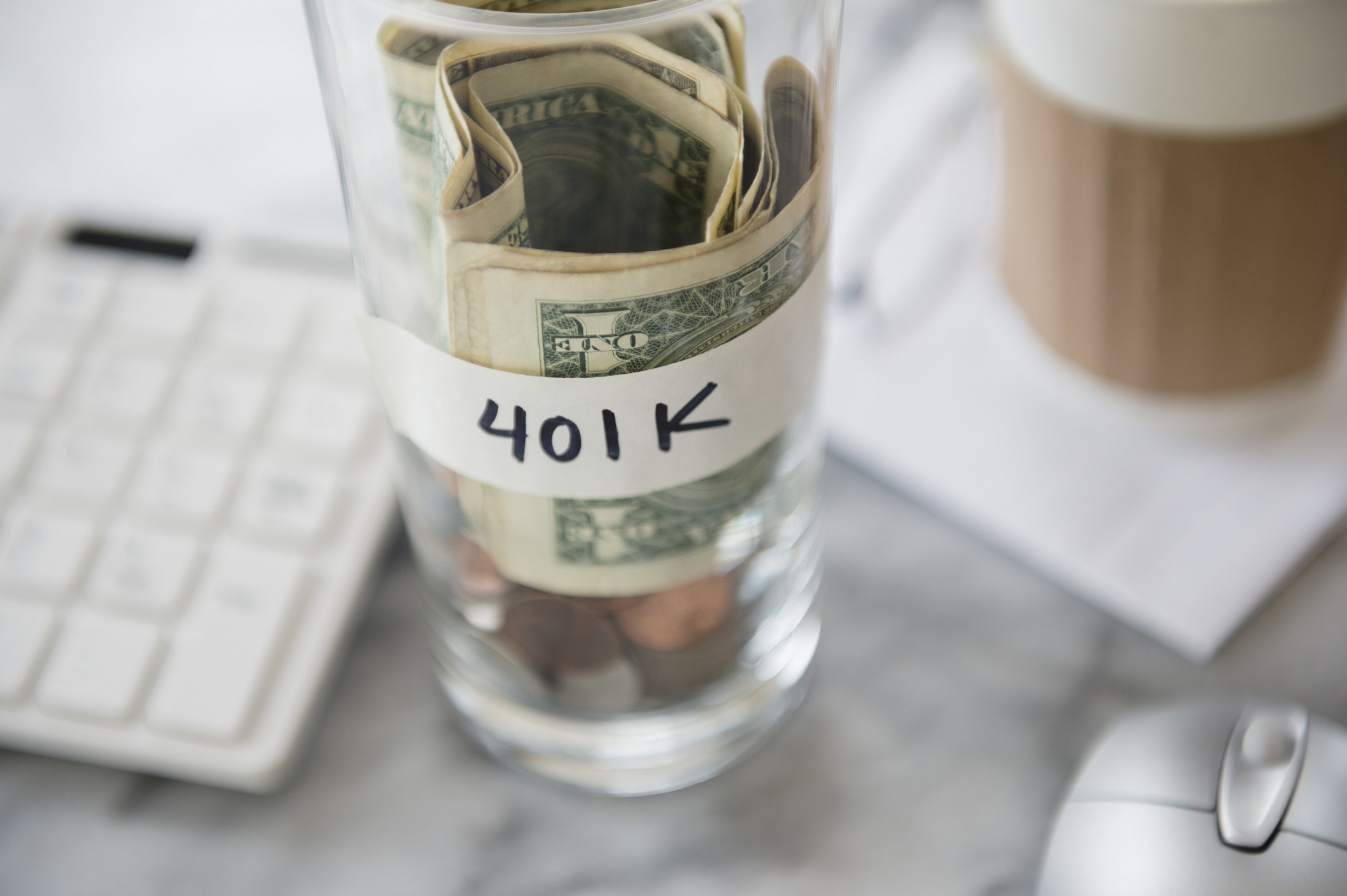 Jar of money labeled 401(k)