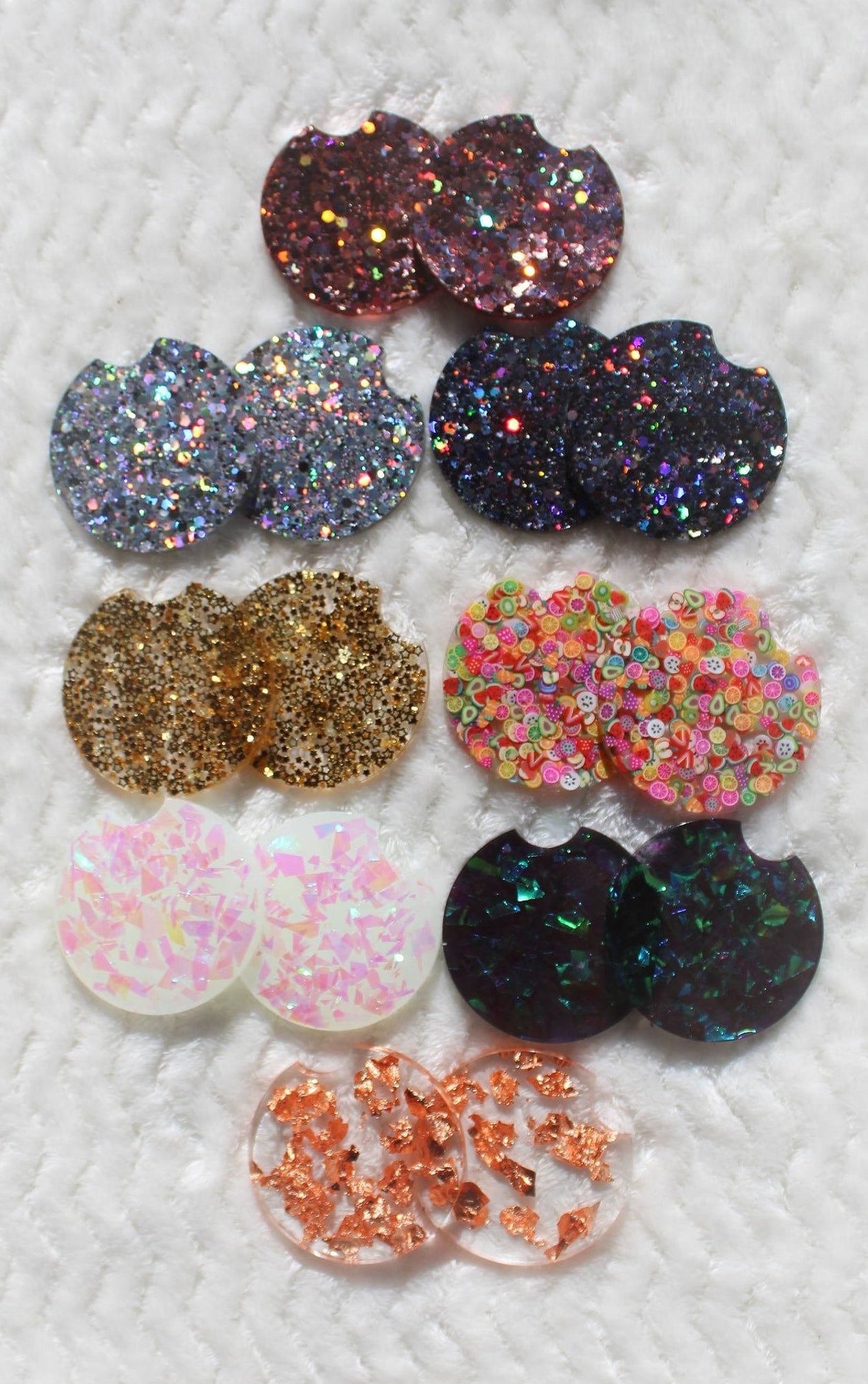 eight sets of resin coasters in different glitter coasters