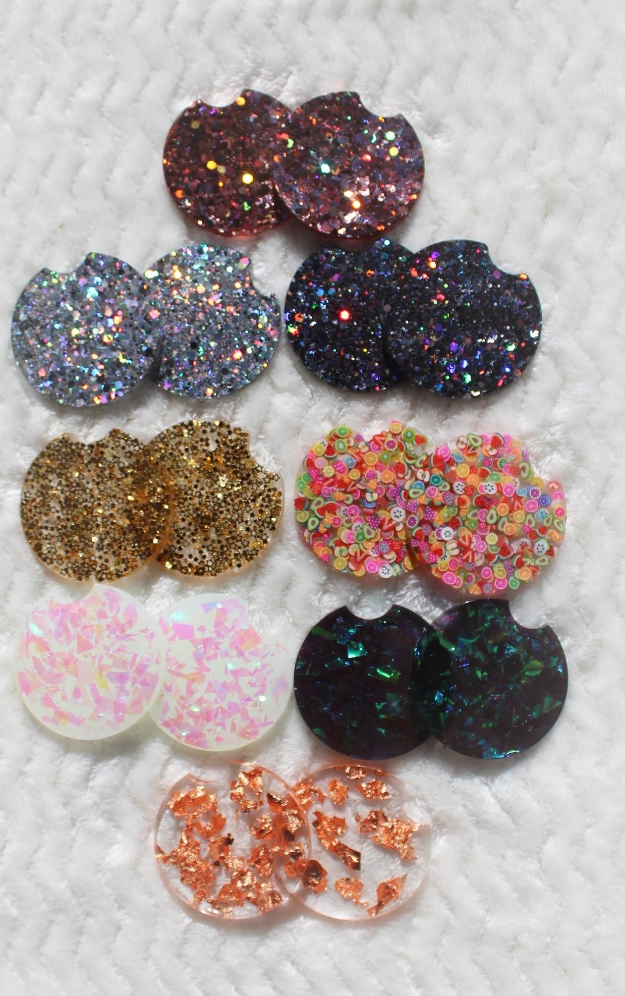 eight sets of resin coasters in different glitter coasters