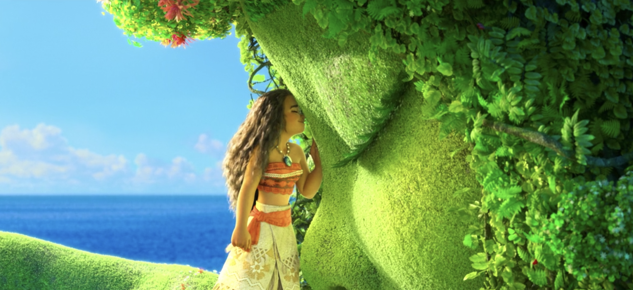 Moana leaning her head against Te Fiti