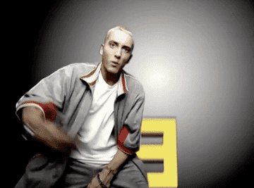 GIF of Eminem rapping with an E behind him in &quot;The Real Slim Shady&quot; video
