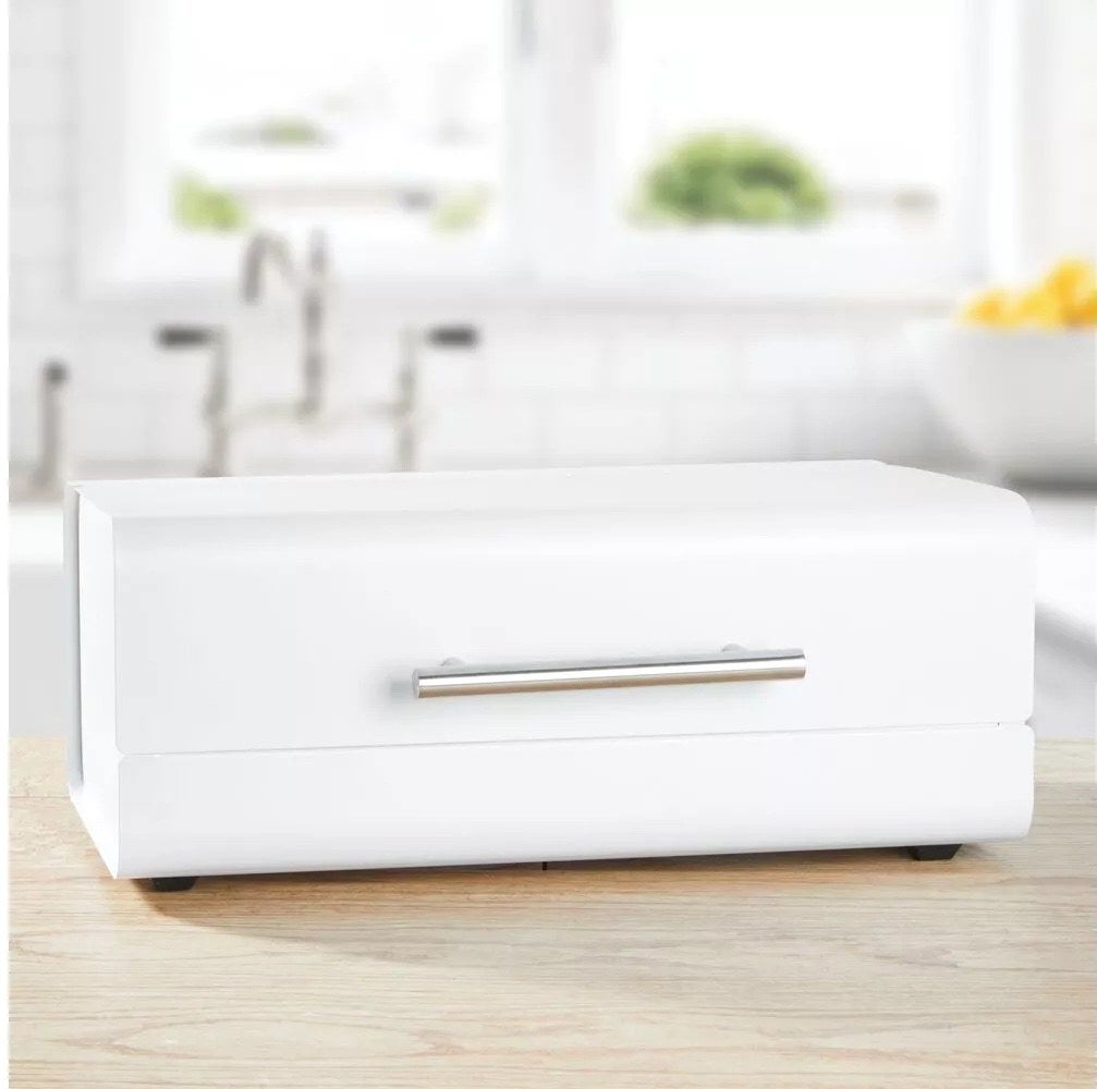 the white breadbox on a counter