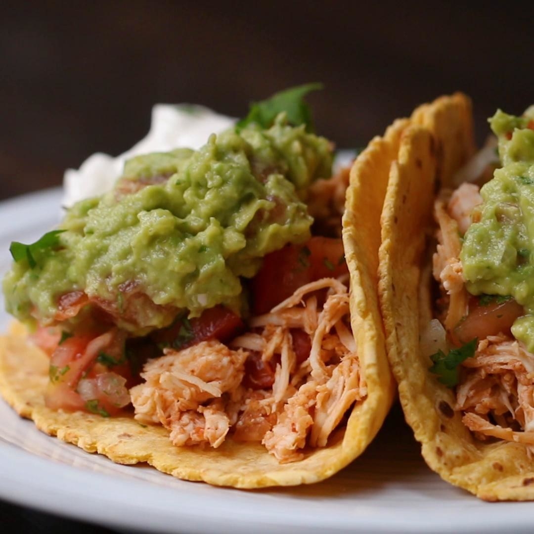 Pulled chicken tacos with guacamole.