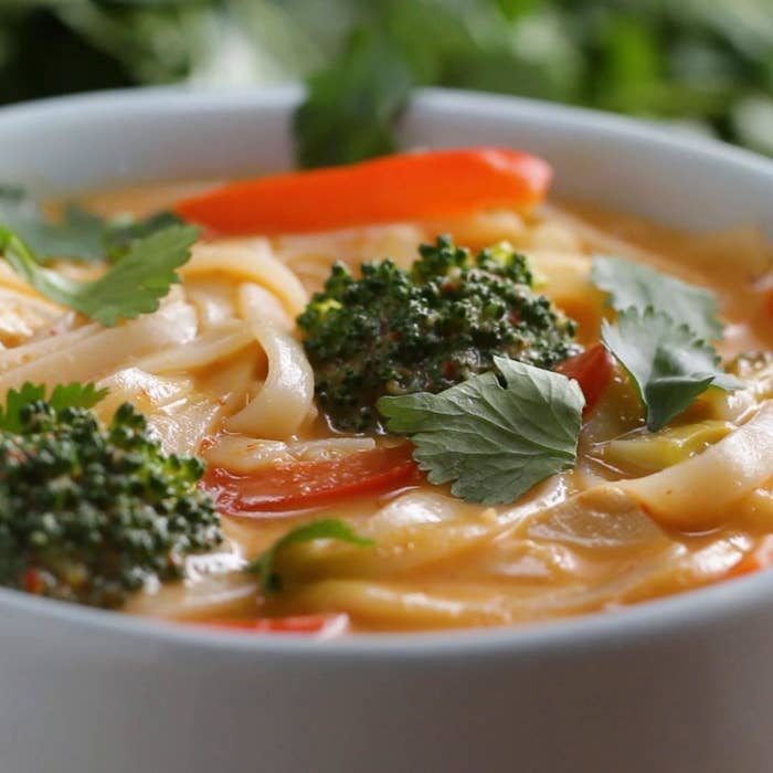 Curry noodle soup with broccoli and peppers.