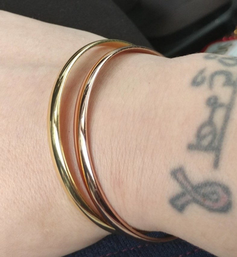 A reviewer wearing the bangles 