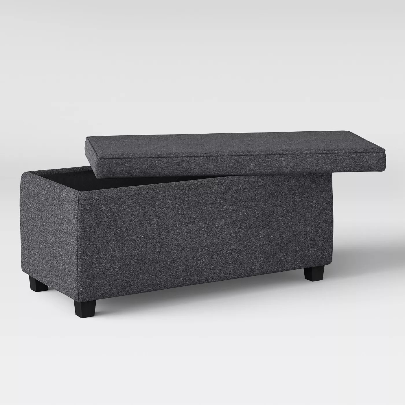The rectangular ottoman with storage underneath the seat