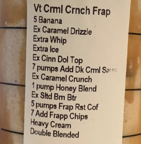 The receipt on the side of a venti caramel frappuccino that lists 13 additional ingredients 